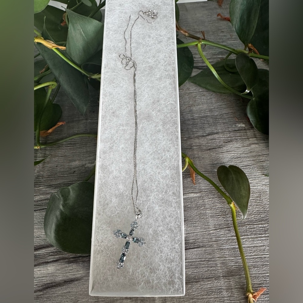 Silver And Topaz Cross Pendant Necklace